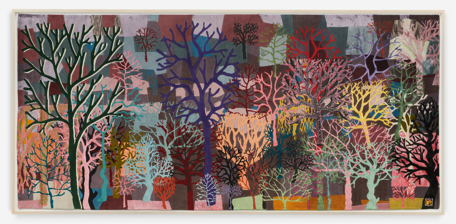 Silk and wool scene consisting of barren trees in shades of blue, pink, yellow and mroe.