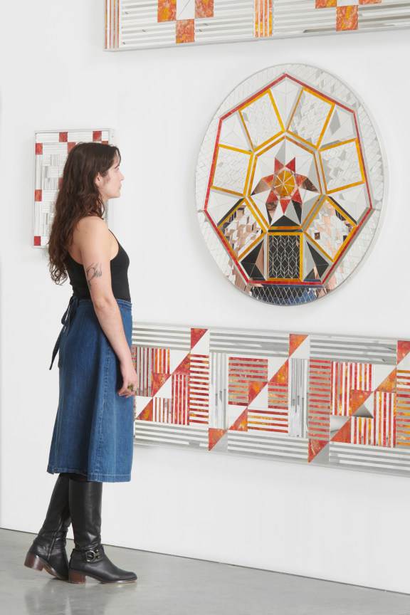 person observing a glass circle