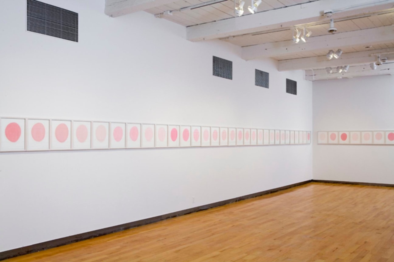 light pink pastel circles on paper, all stacked in a row