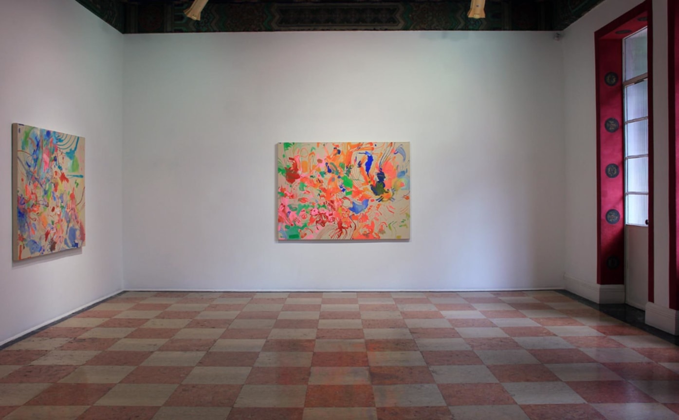 installation view of two abstract paintings