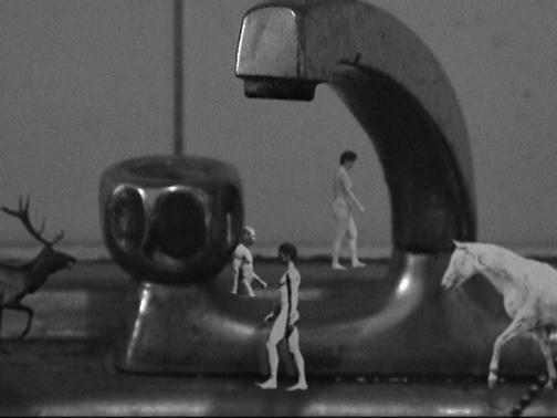 small people and animals walking around a faucet