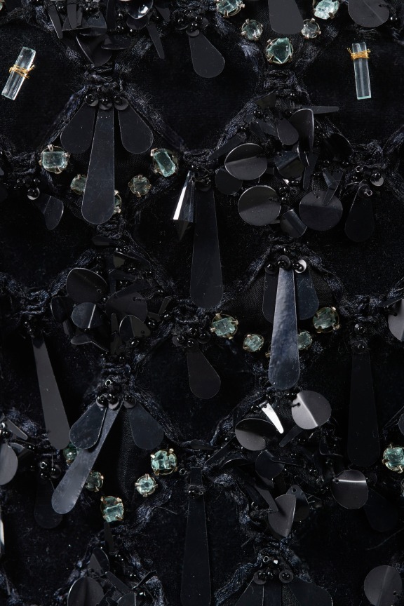 close up of black dress's beading