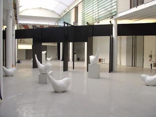 lots of white bird statues