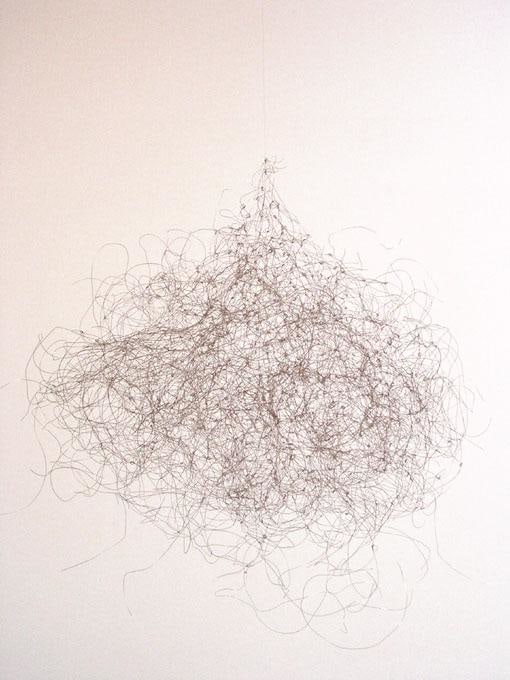 wired steel knotted together and suspended from the ceiling
