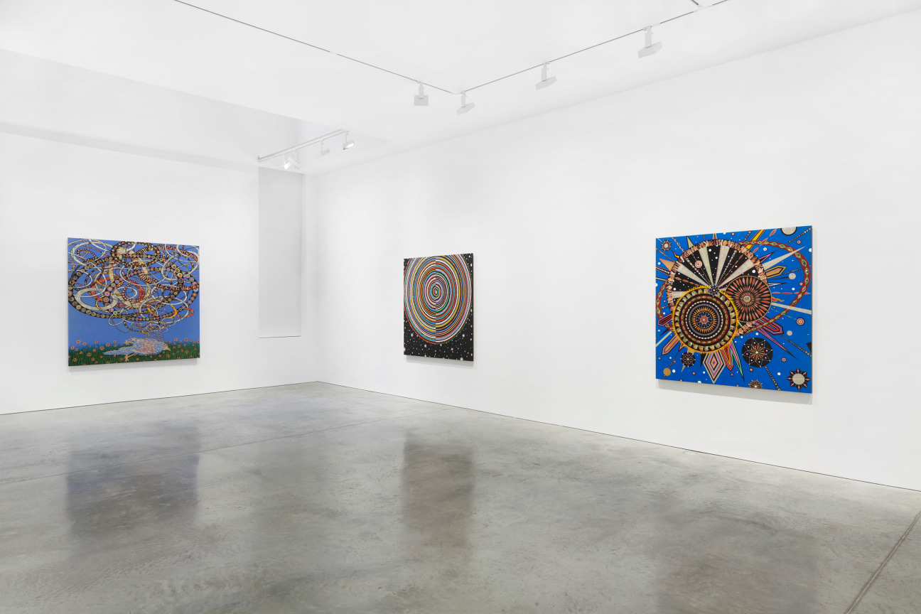 view of three paintings