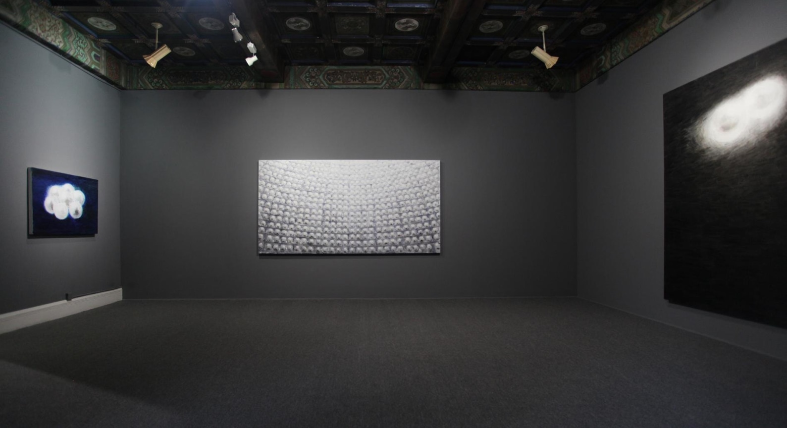 installation view of three artworks on adjacent walls