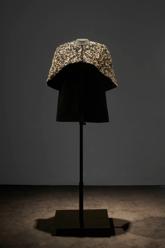 shoulder piece in a dimly lit room