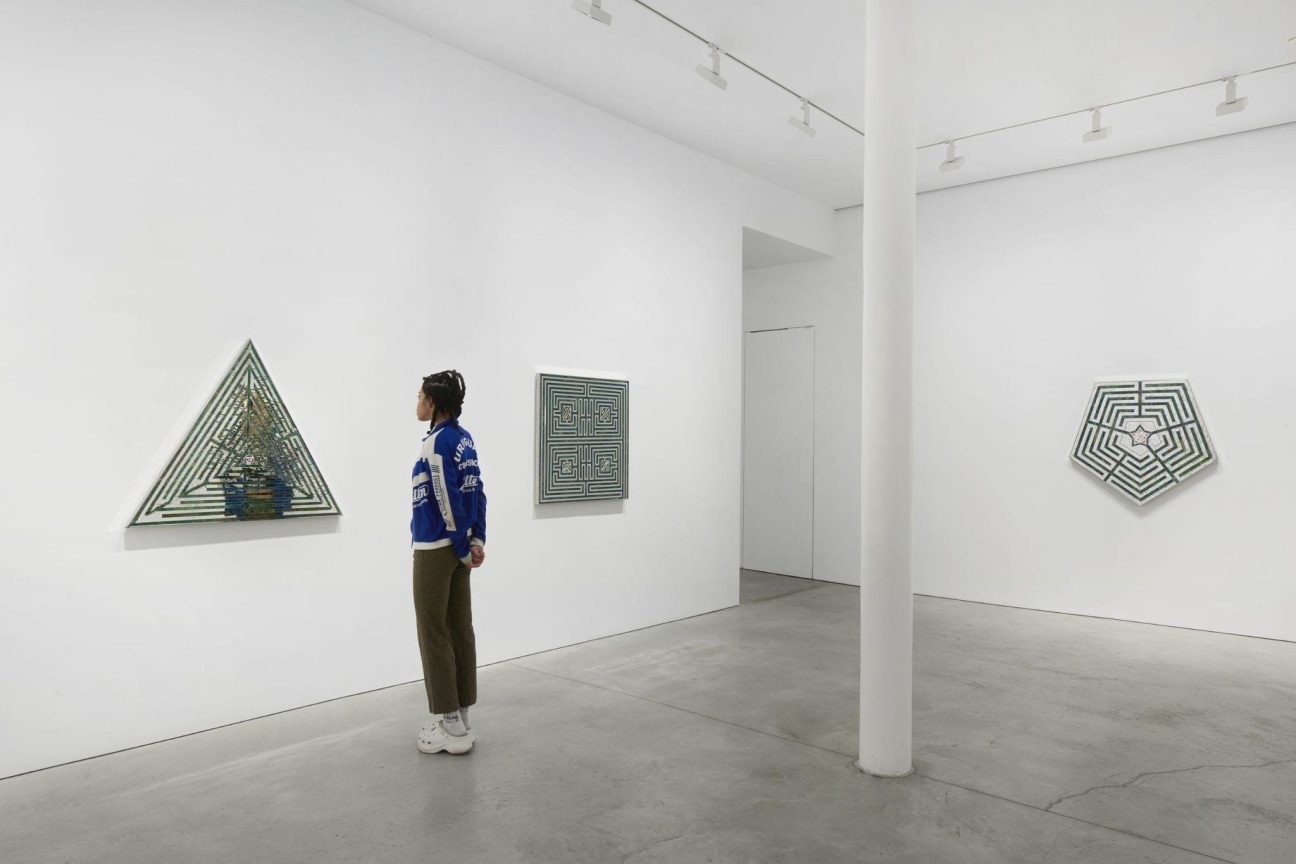 Installation shot of Mirror-works and Drawings by Monir Shahroudy Farmanfarmaian.