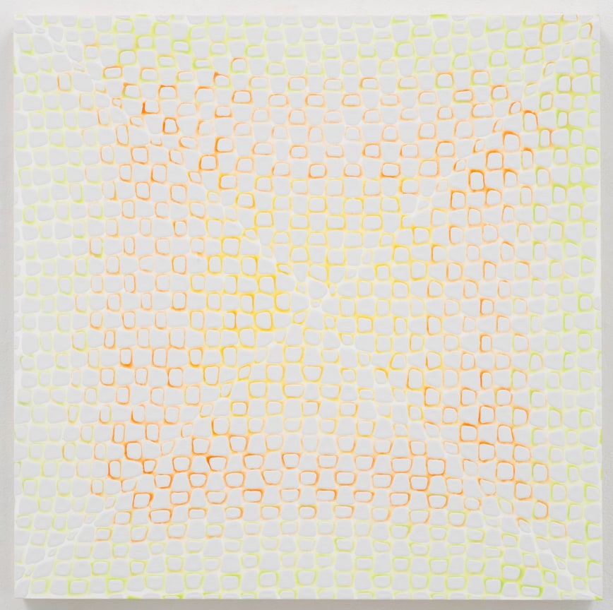 enamel with a circular pattern with a yellow and orange tint