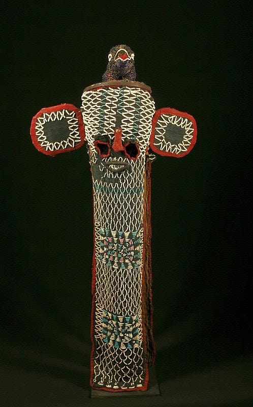elongated mask with a bird shape on the top