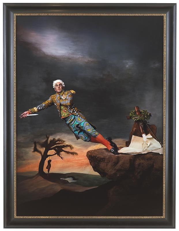 a man falling off a cliff while a holding a knife at himself