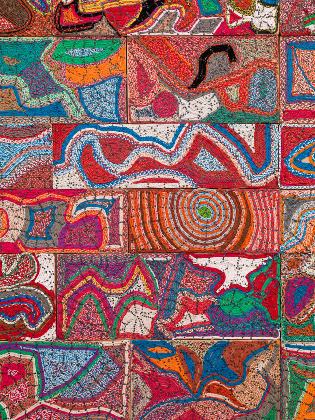 close up of electrical wires and components creating multicolored shapes