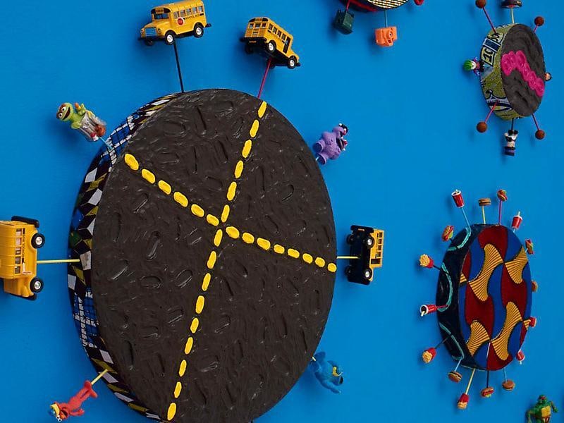 closeup of circles surrounded by toys