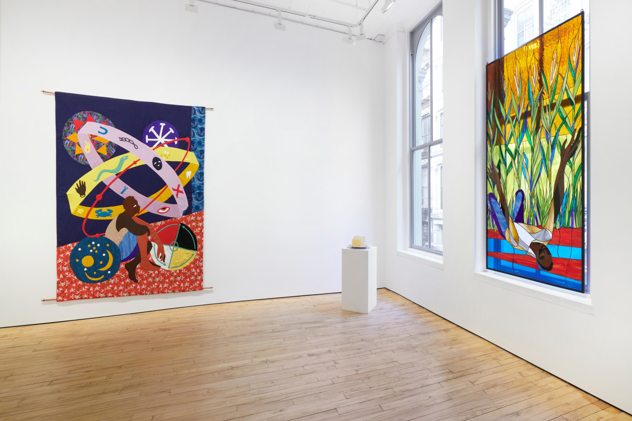 view of three artworks