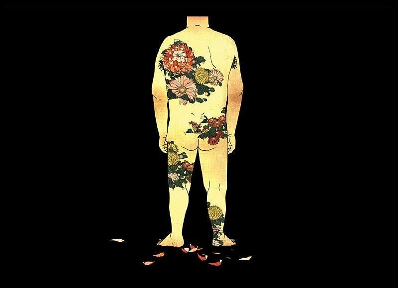 person in the nude with flowers drawn or tattooed on their body