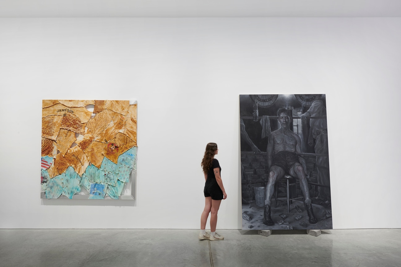 person looking at a painting of a tired boxer