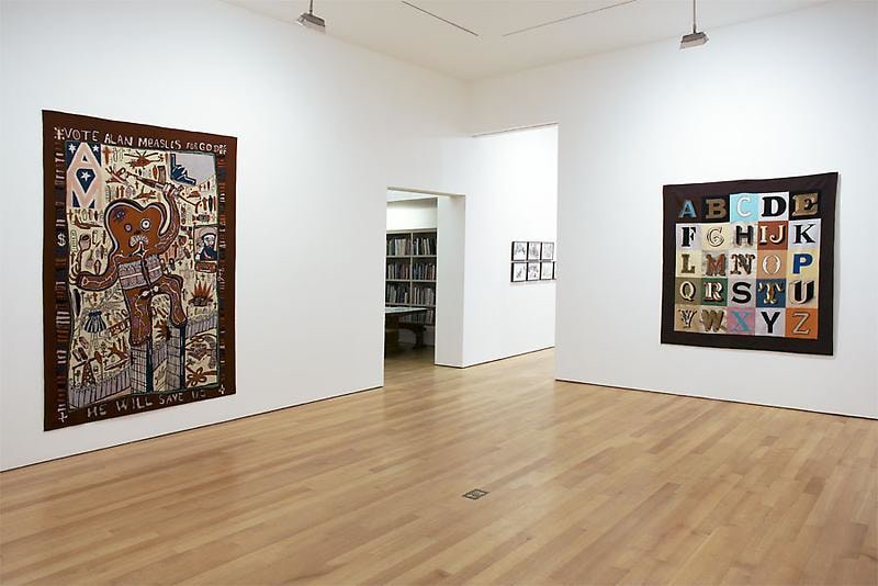 installation view of two tapestries