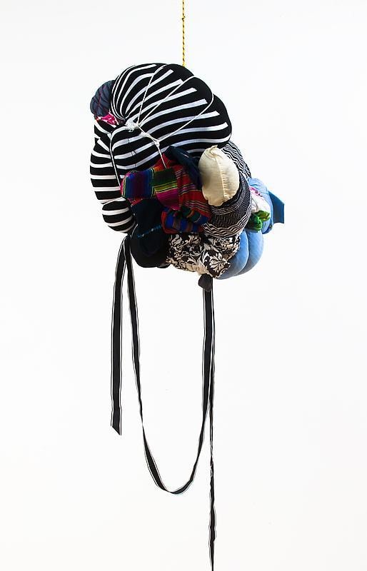 bundle of cloth hanging from the ceiling