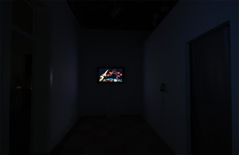 image of a small video recording being shown in the dark