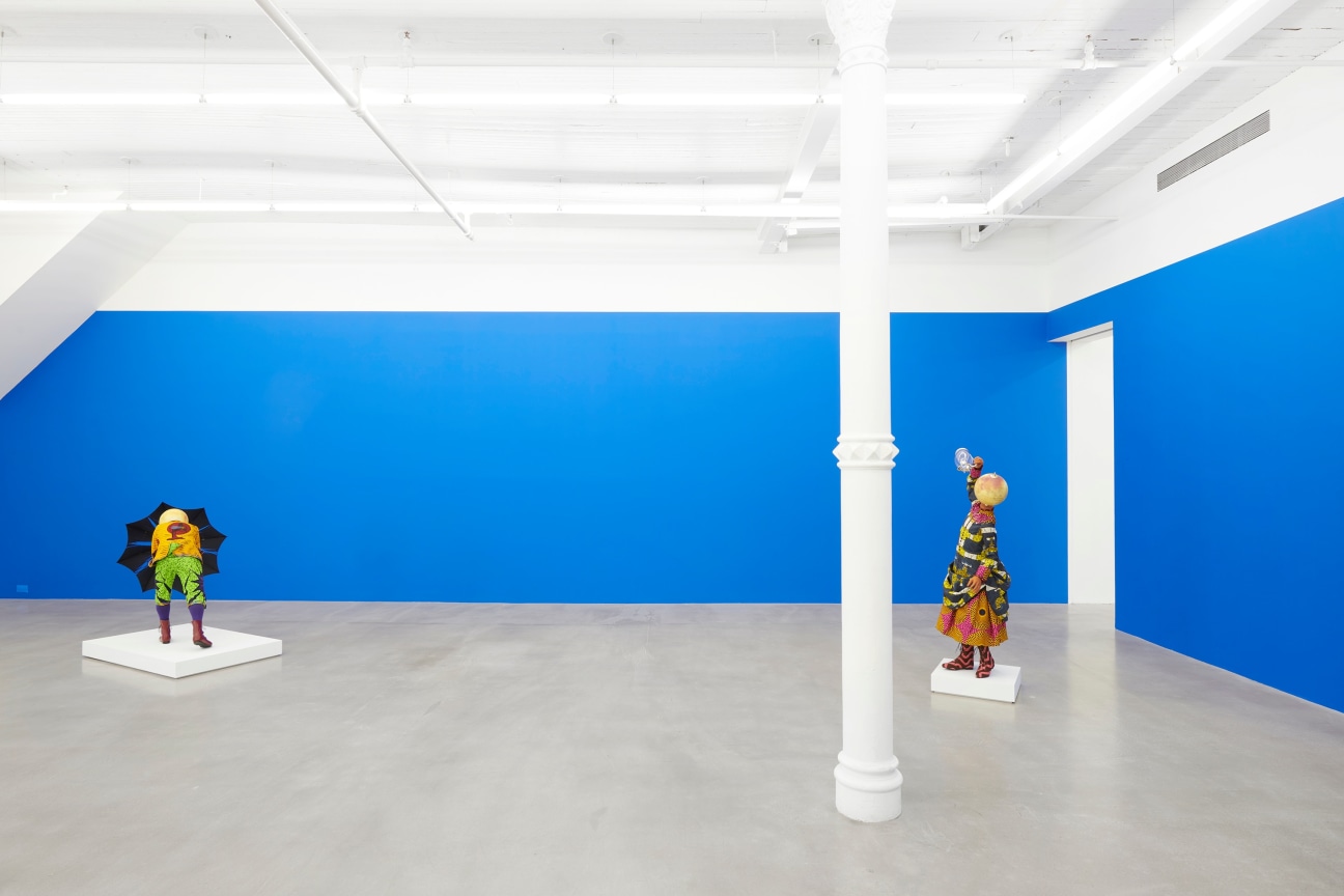 view of two elaborately dressed mannequins