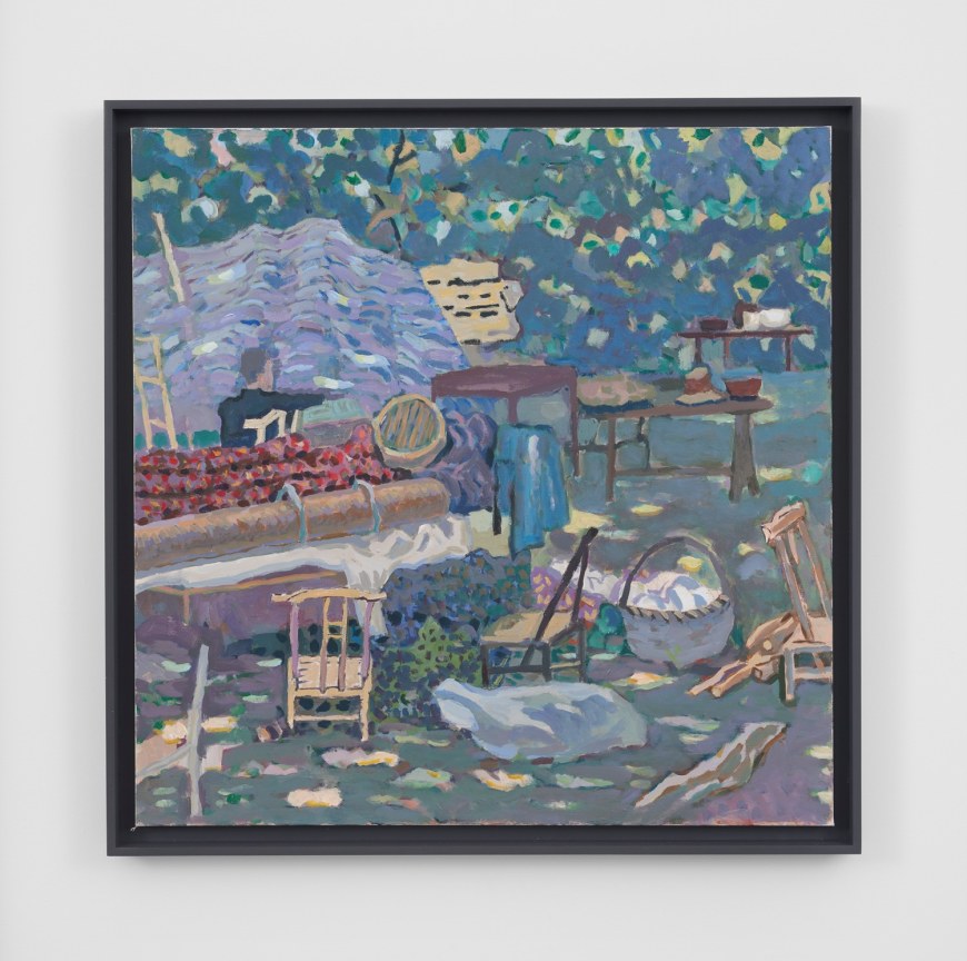 an outdoor scene depciting scattered items such as chairs and wicker baskets