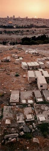 cityscape of Jerusalem with a cemetery in the lower half of the shot