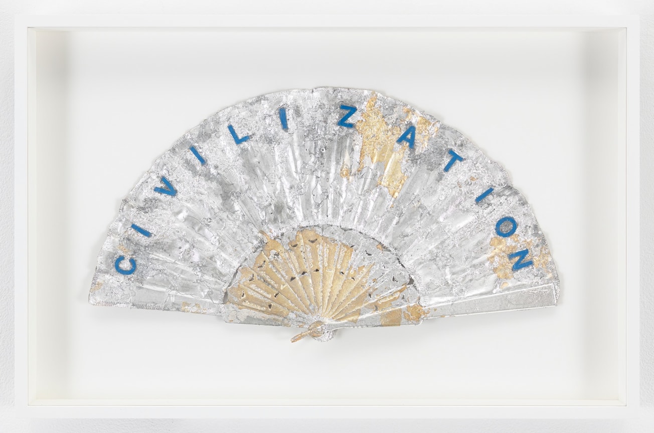 Gold hand fan gilded with silver leaf with the word CIVILIZATION pasted on it by SIMON EVANS&trade;.