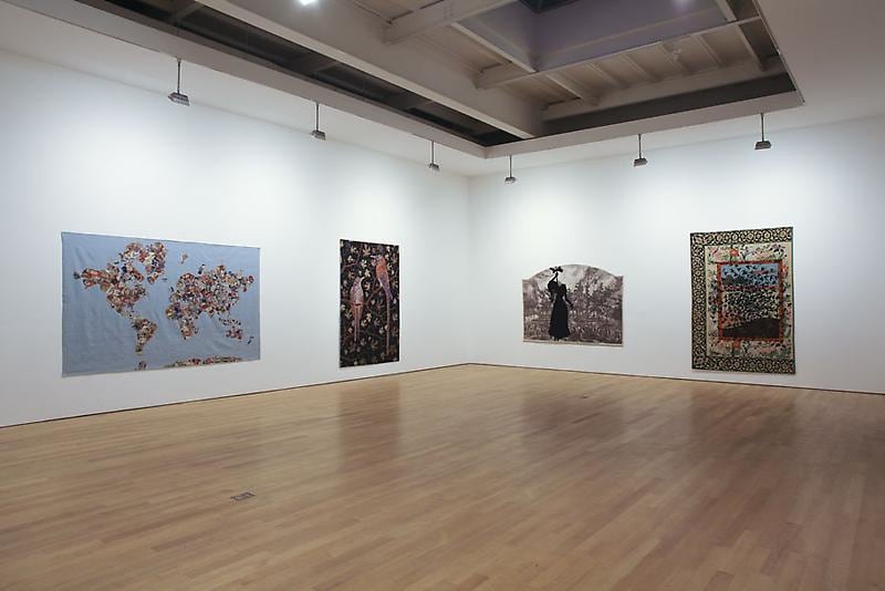 installation view of four tapestries