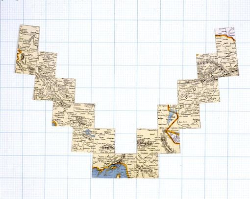 maps pasted on a giant grid in the shape of a giant V