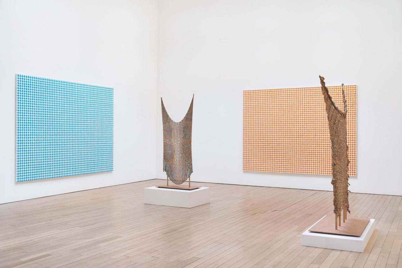 Installation view of four artworks