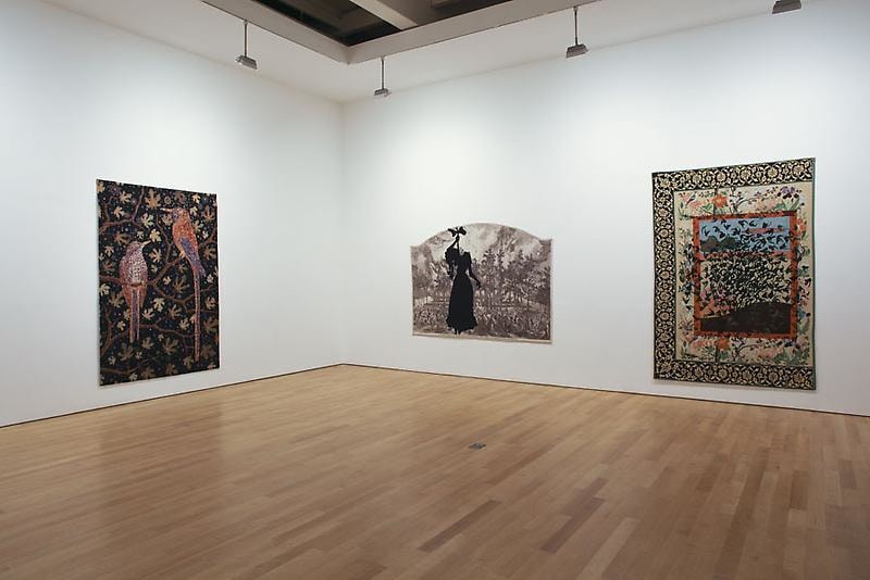 installation view of three tapestries