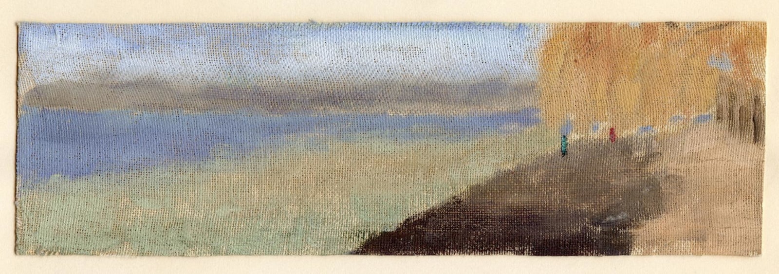 golden willow tree arching over a dirt road next to a river