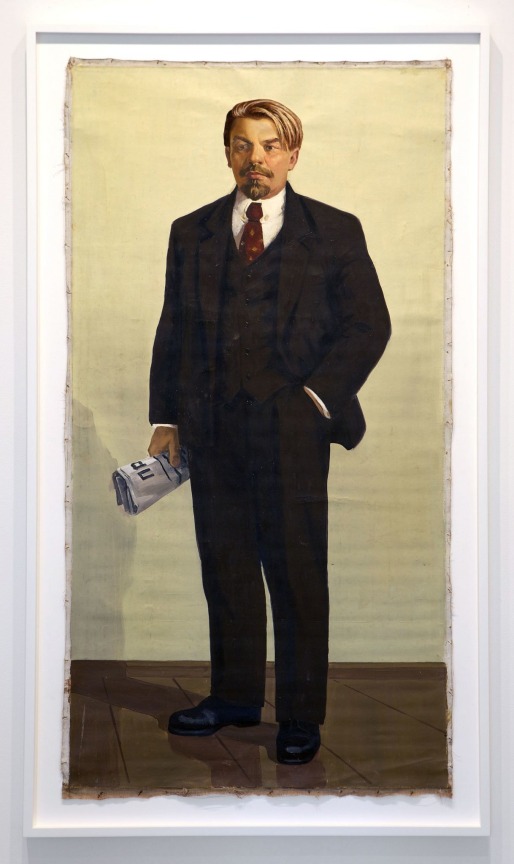 Oil and embroidery on canvas of a man in a suit holding a newspaper