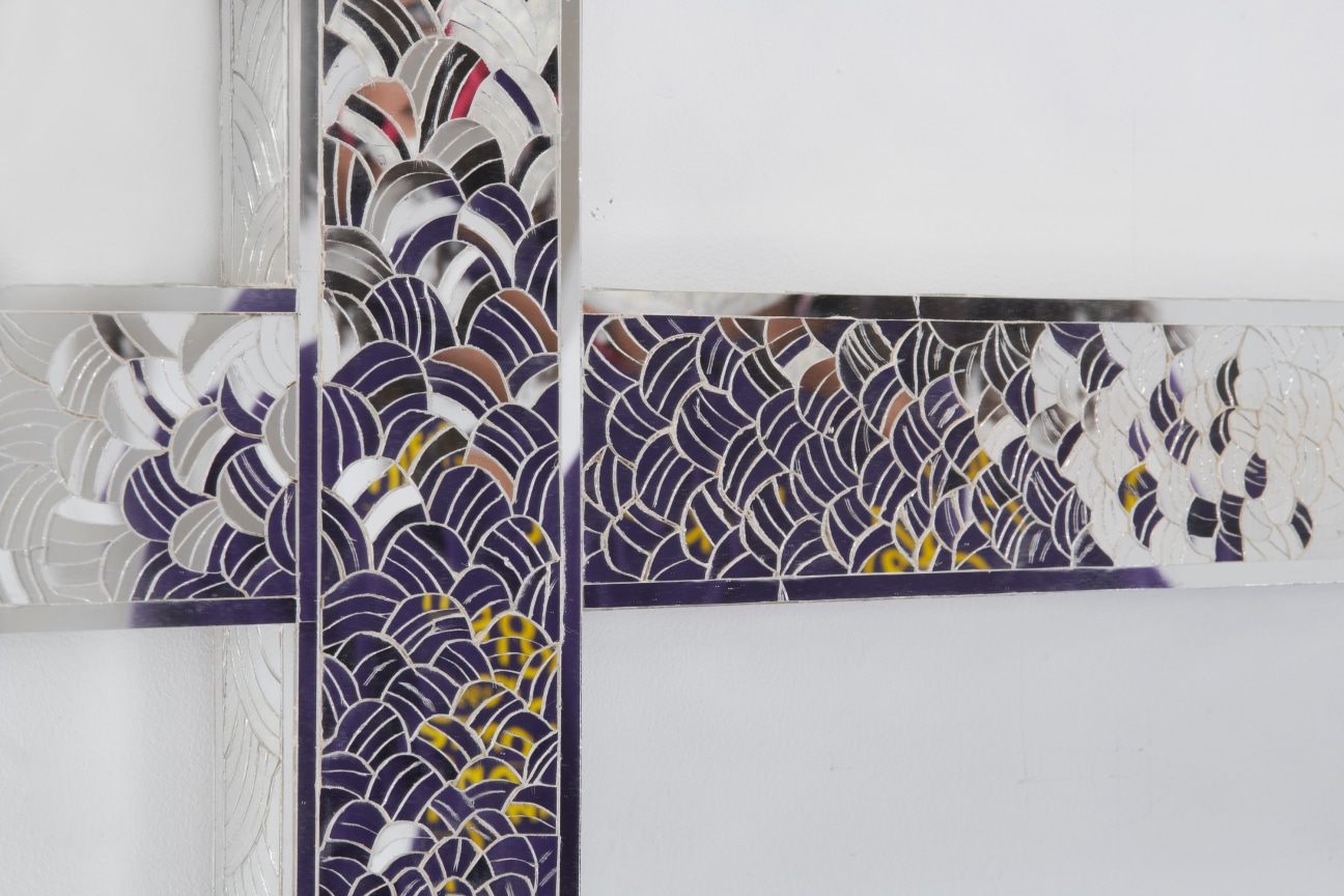 glass pieces creating a scale-like pattern