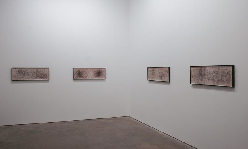 installation view of four artworks