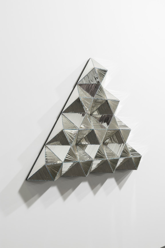 Installation view, Monir Shahroudy Farmanfarmaian,&nbsp;Third Family, 2011,&nbsp;Series of 8 sculptures,&nbsp;Reverse painted glass, mirrored glass, and plaster,&nbsp;Dimensions variable, Art Basel Unlimited, Switzerland