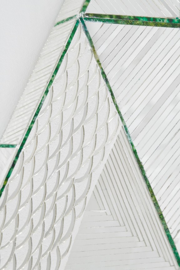 close up of glass pieces with curved and straight patterns