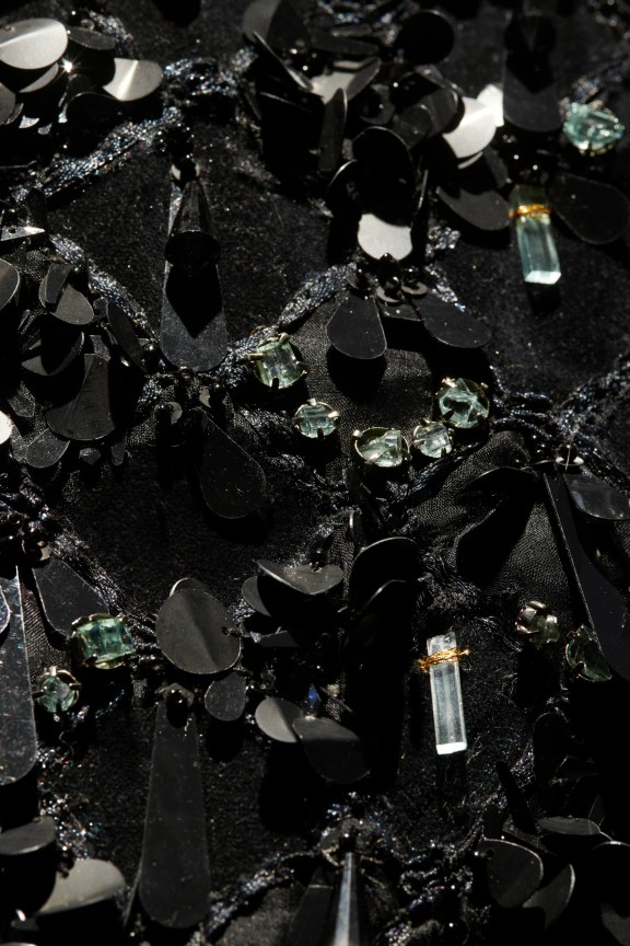 close up of the black dress's beading