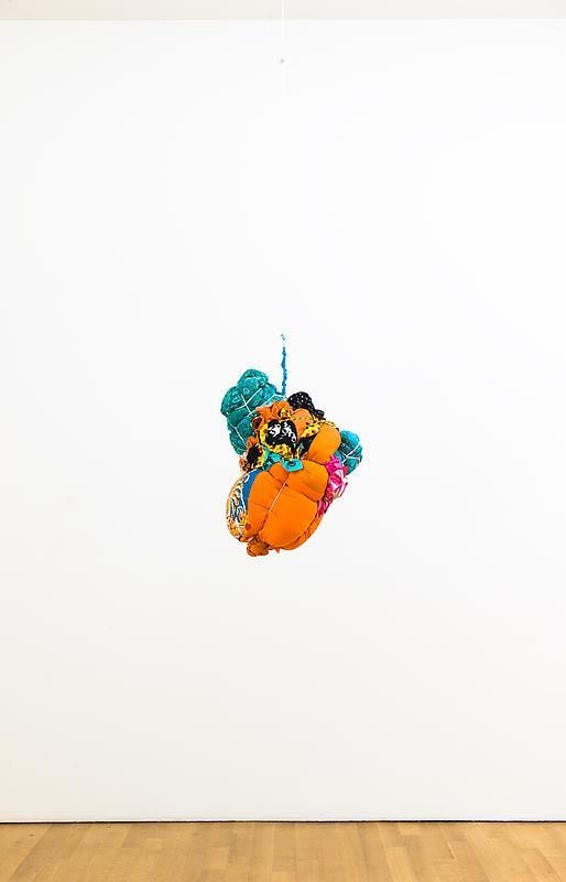 bundle of cloth hanging from the ceiling