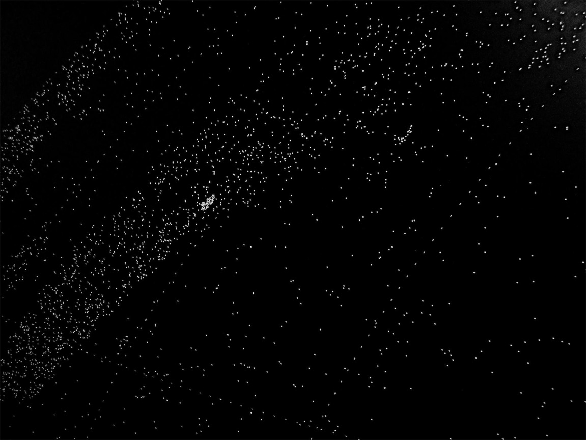 dotted, black surface