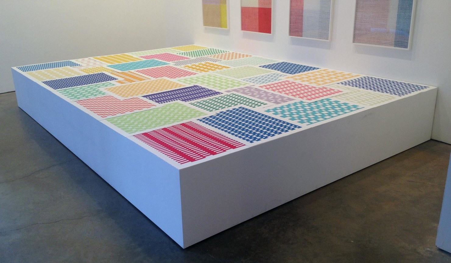 pedestal with several fabric patterns