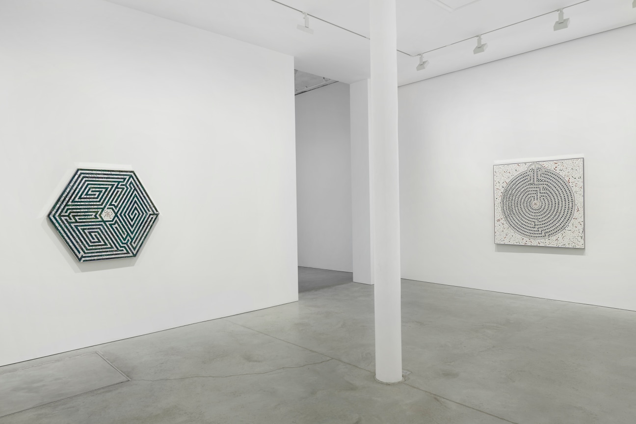 view of two glass artworks within a gallery