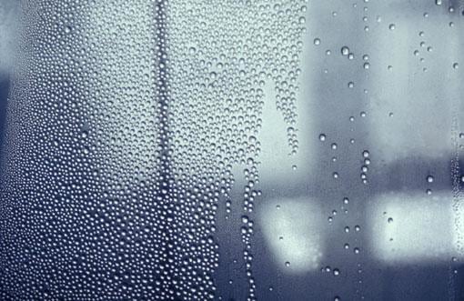water bubbles over glass