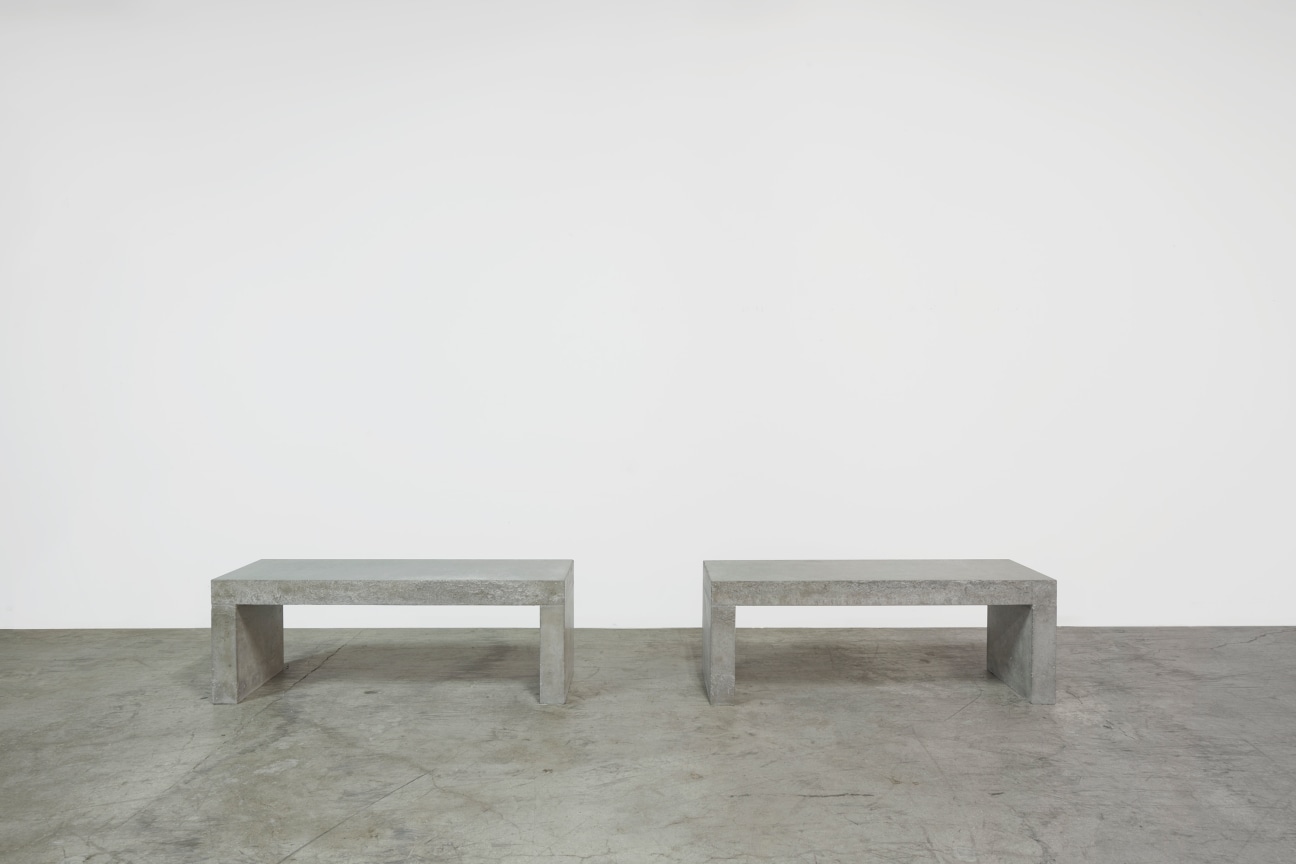 Two benches on cement floor