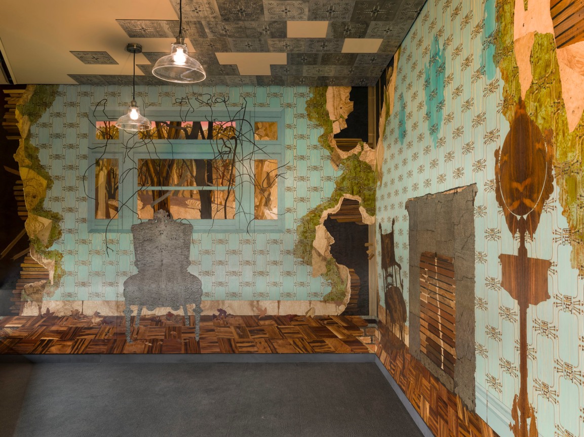 two walls of wooden veneer depicting an abandoned home interior