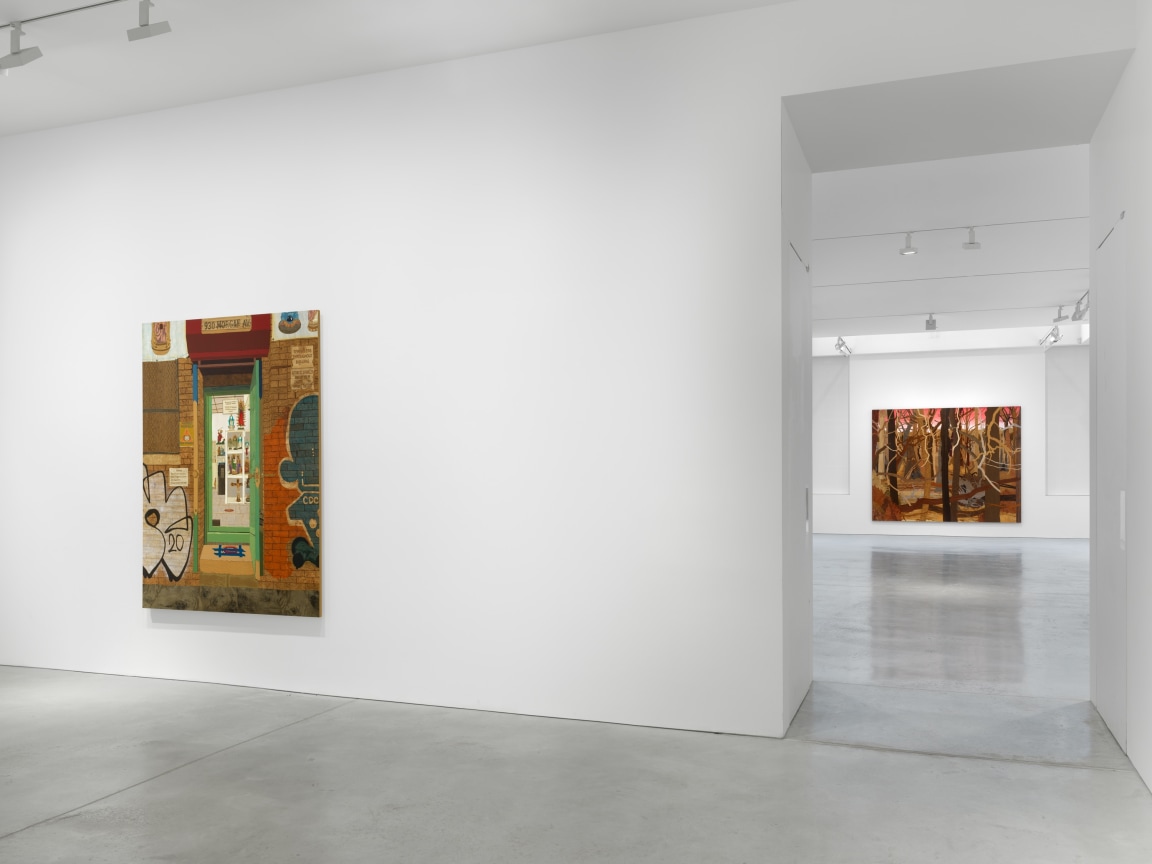 gallery view of an artwork next to an entryway revealing more art