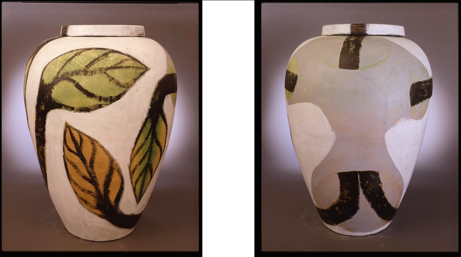 green and orange leaves in the front; starting point of the leaves' stems in the back