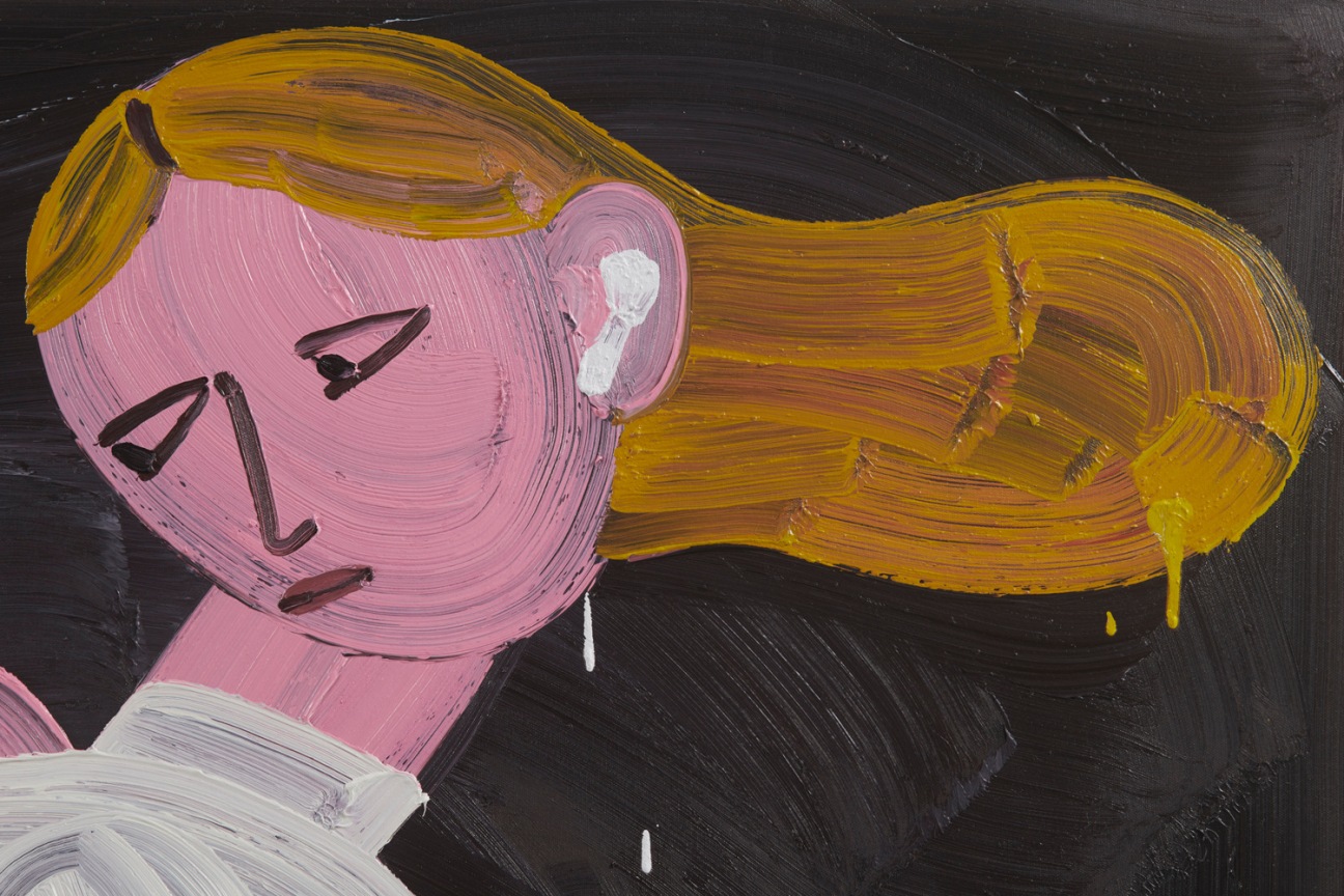 a woman's head with ear buds on