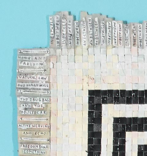 Detail image of paper woven together to create a rug-like object by SIMON EVANS&trade;.