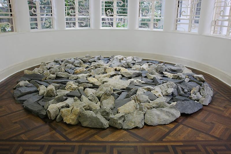 rocks on the floor piled together in a circle